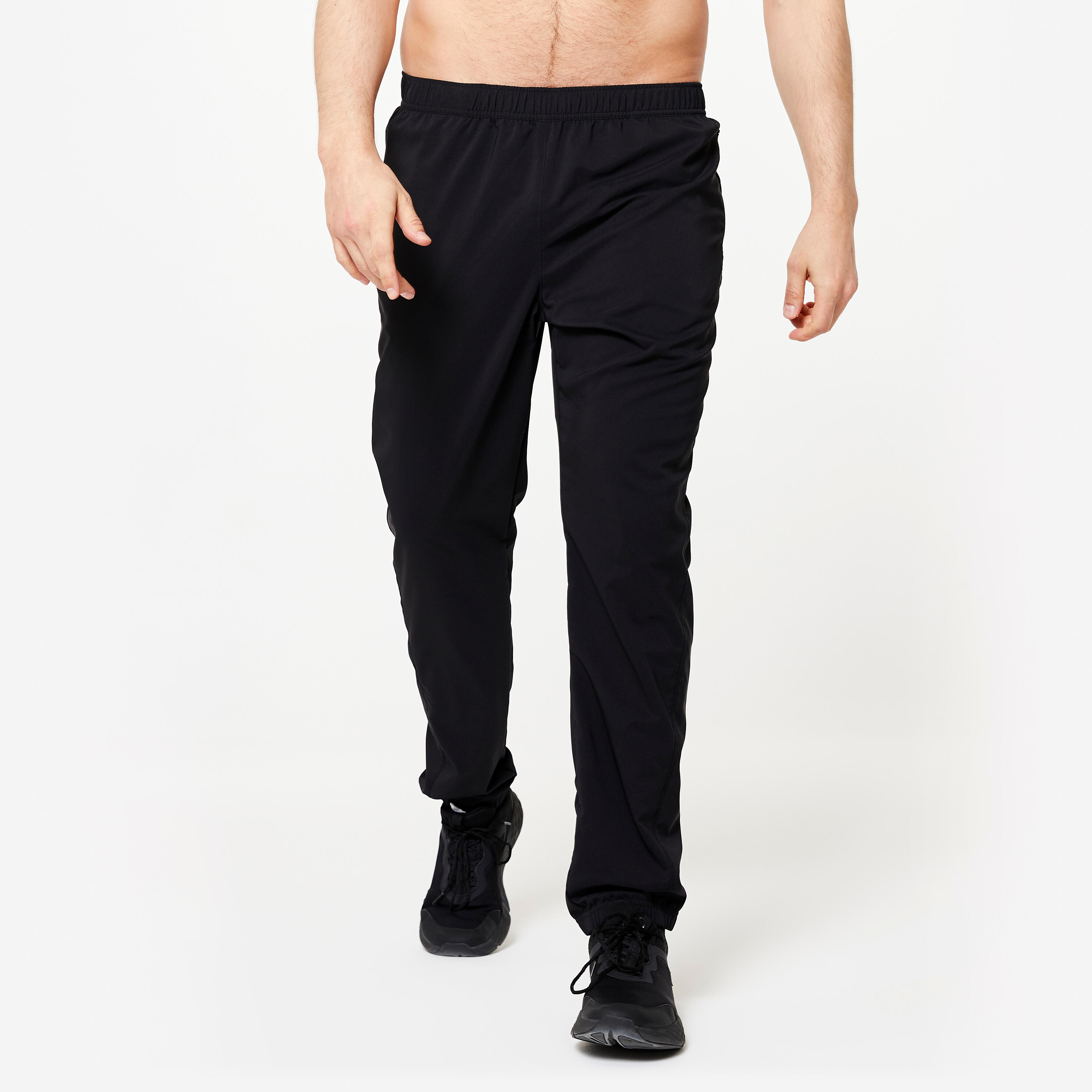 DOMYOS Pánske priedušné fitness tepláky čierne 340@M W32 L33-DOMYOS