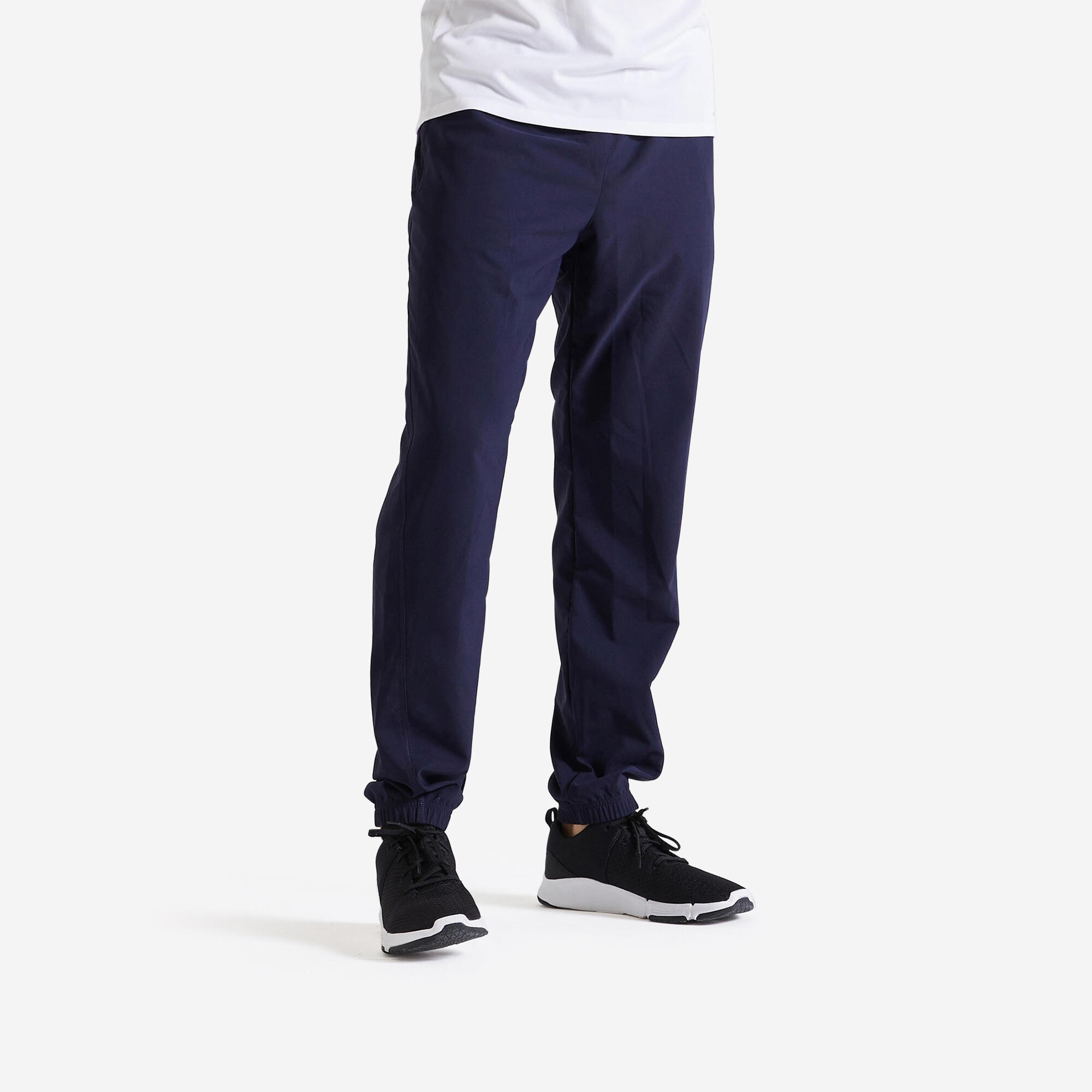 DOMYOS Pánske priedušné fitness tepláky tmavomodré 340@M W32 L33-DOMYOS
