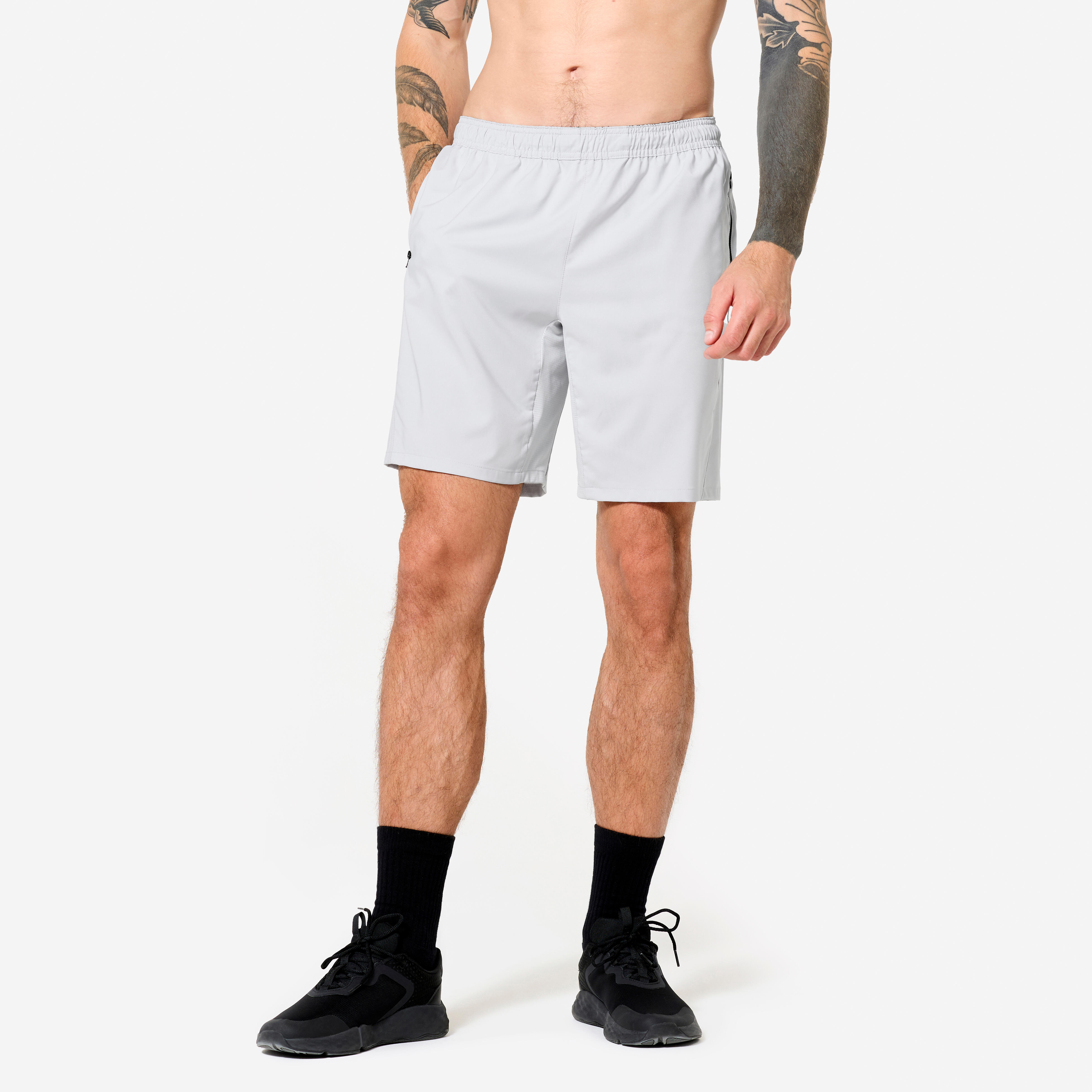 DOMYOS Pánske fitness šortky priedušné s vreckami na zips sivé šedá 340@L-DOMYOS