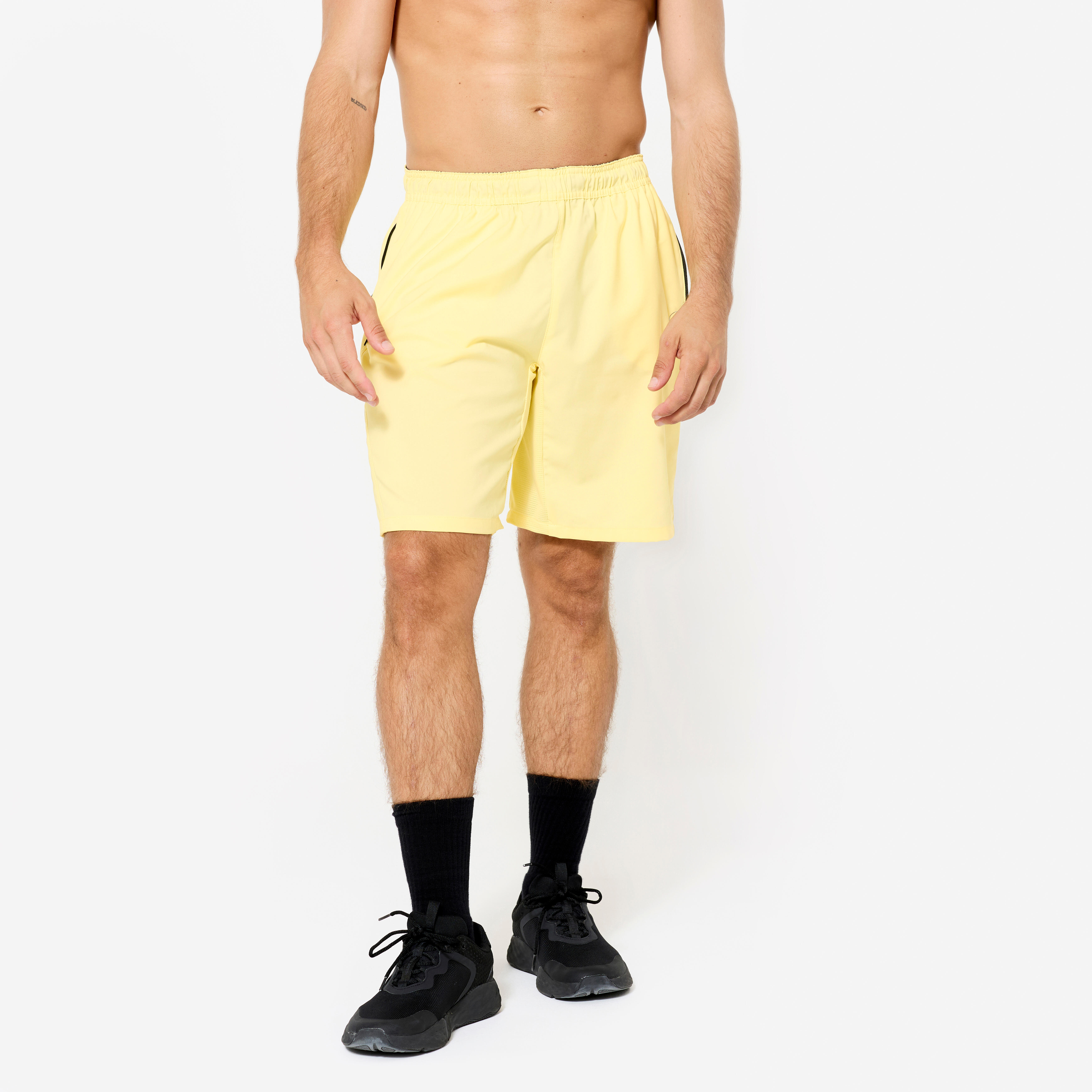 DOMYOS Šortky na fitness s vreckami na zips pastelovo žlté žltá 340@L-DOMYOS